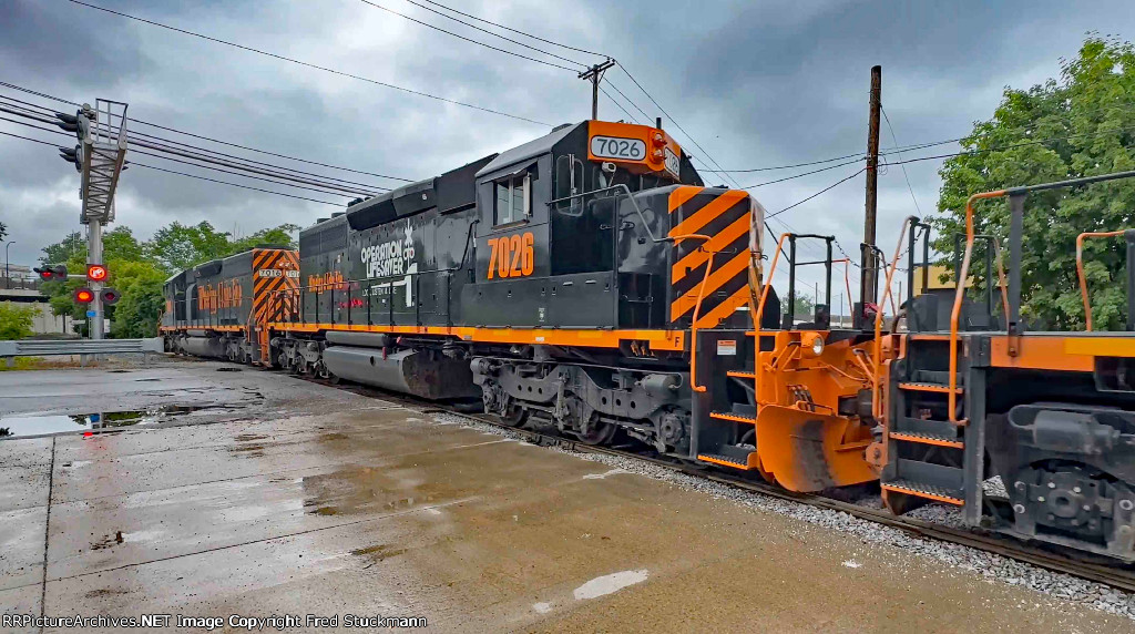 WE 7026